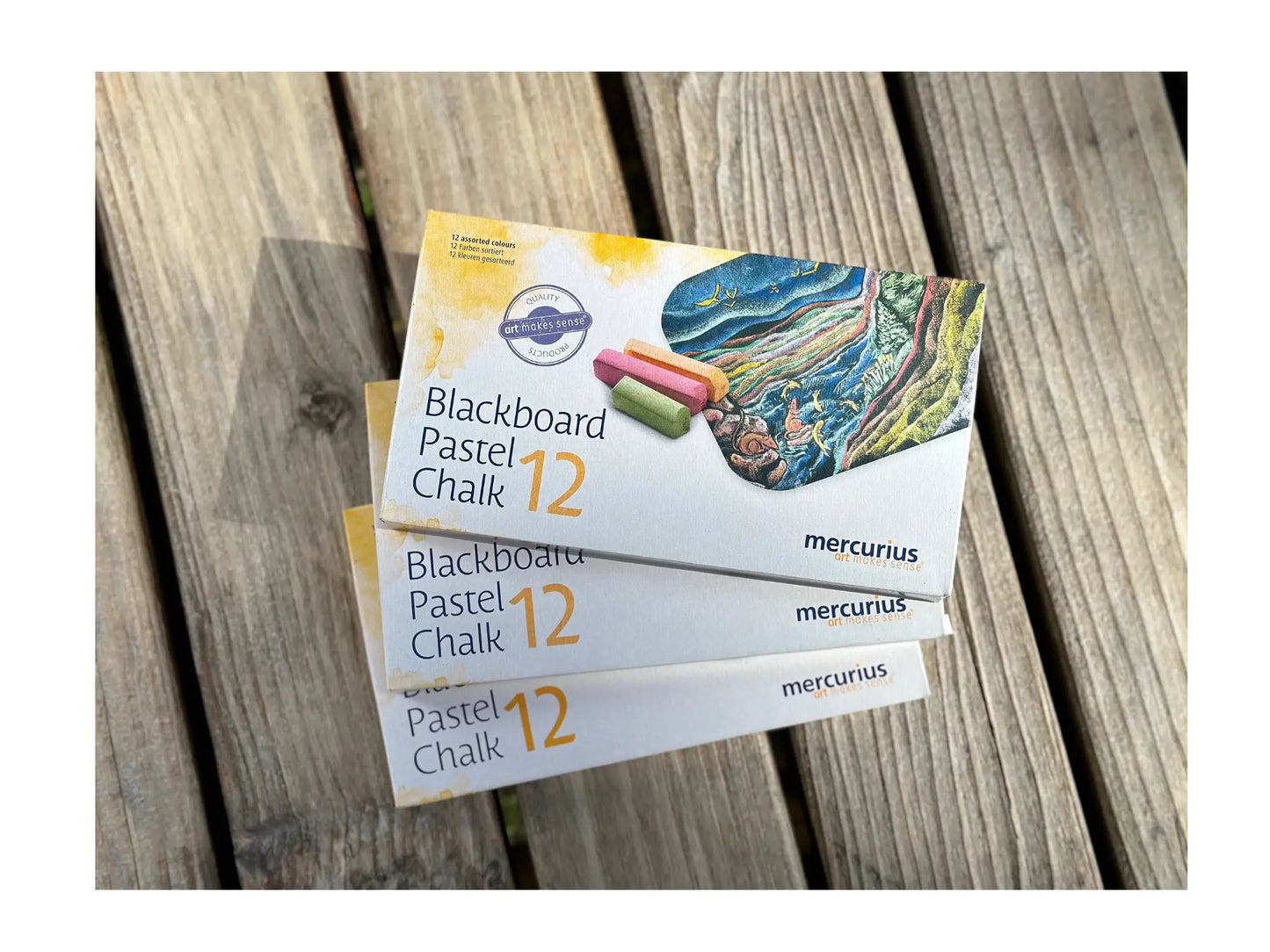 Packaging of Blackboard Pastel Chalk with mercurius branding on a wooden surface