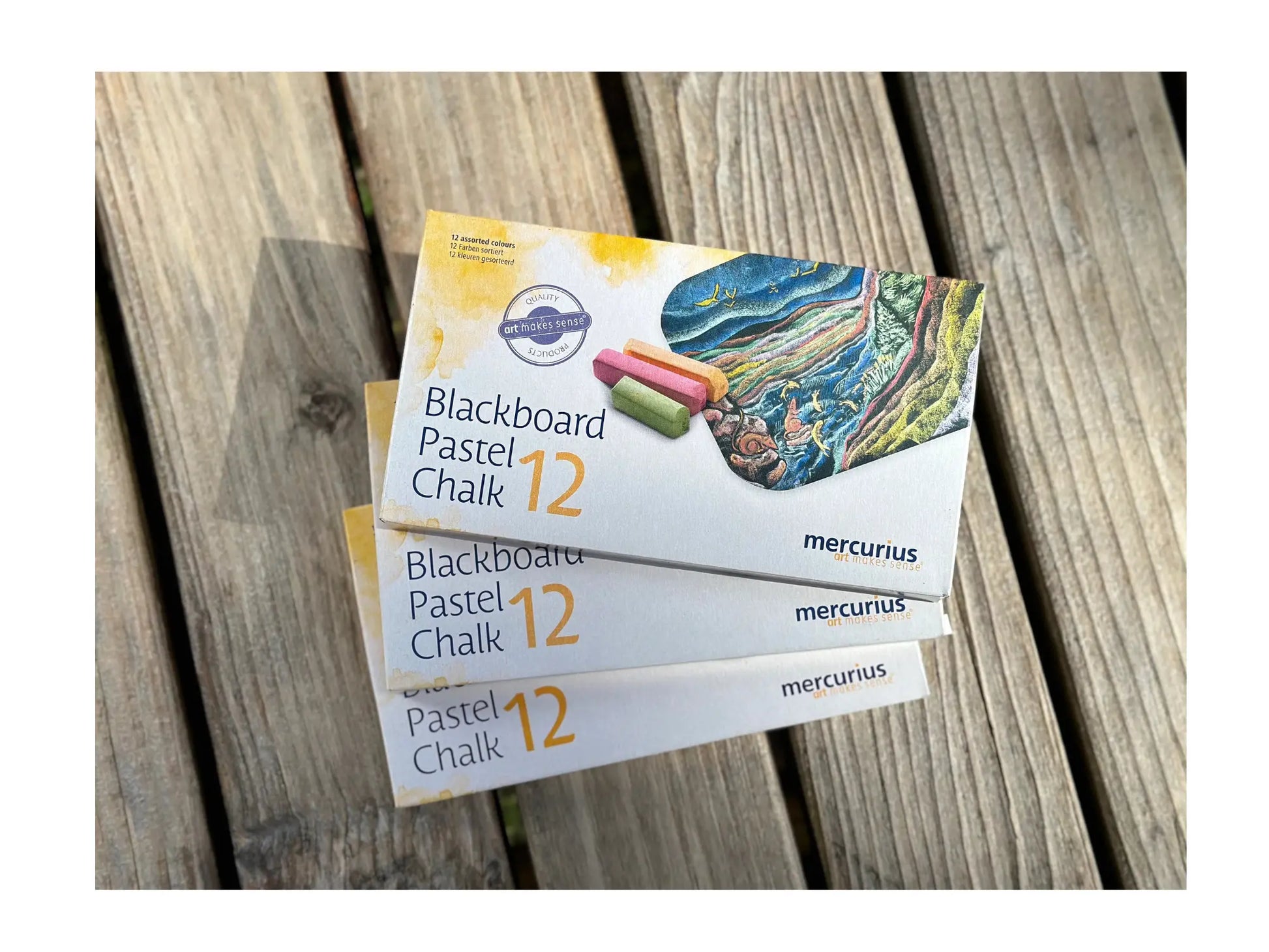 Packaging of Blackboard Pastel Chalk with mercurius branding on a wooden surface