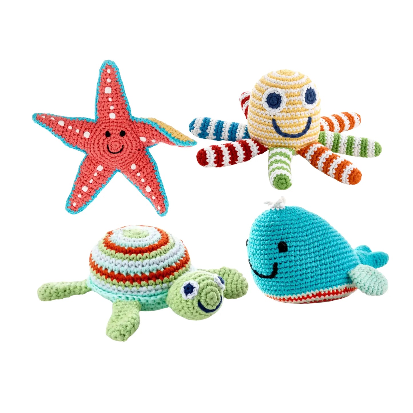 A crocheted set of starfish, octopus, sea turtle, and whale on a white background
