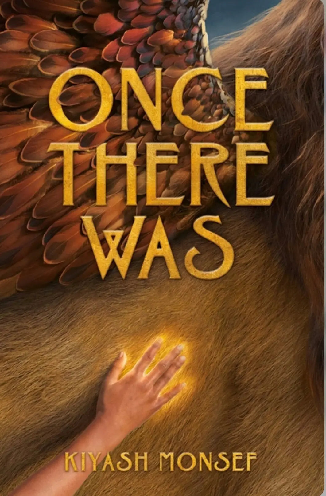 Book cover of 'Once There Was' by Kiyash Monsef with a hand touching a creature's fur.