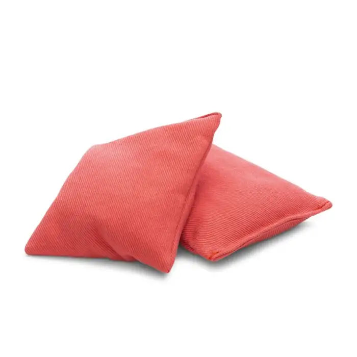 Two red bean bags on a white background