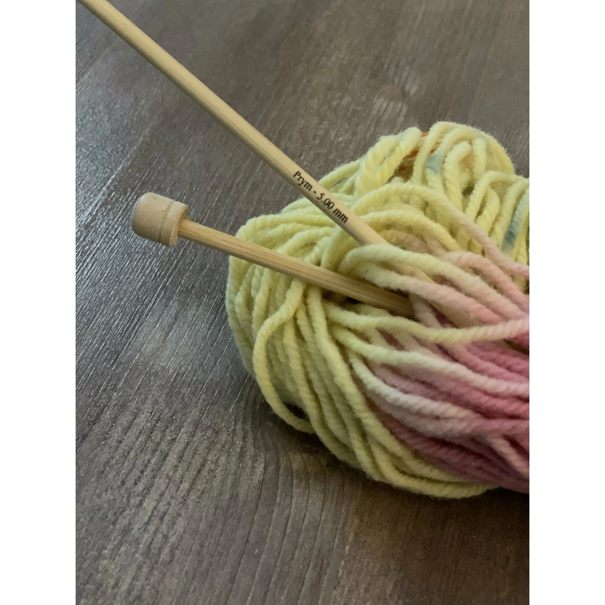 Prym Bamboo Single Point Knitting Needles, 13.4” in the end of rainbow pastel yarn