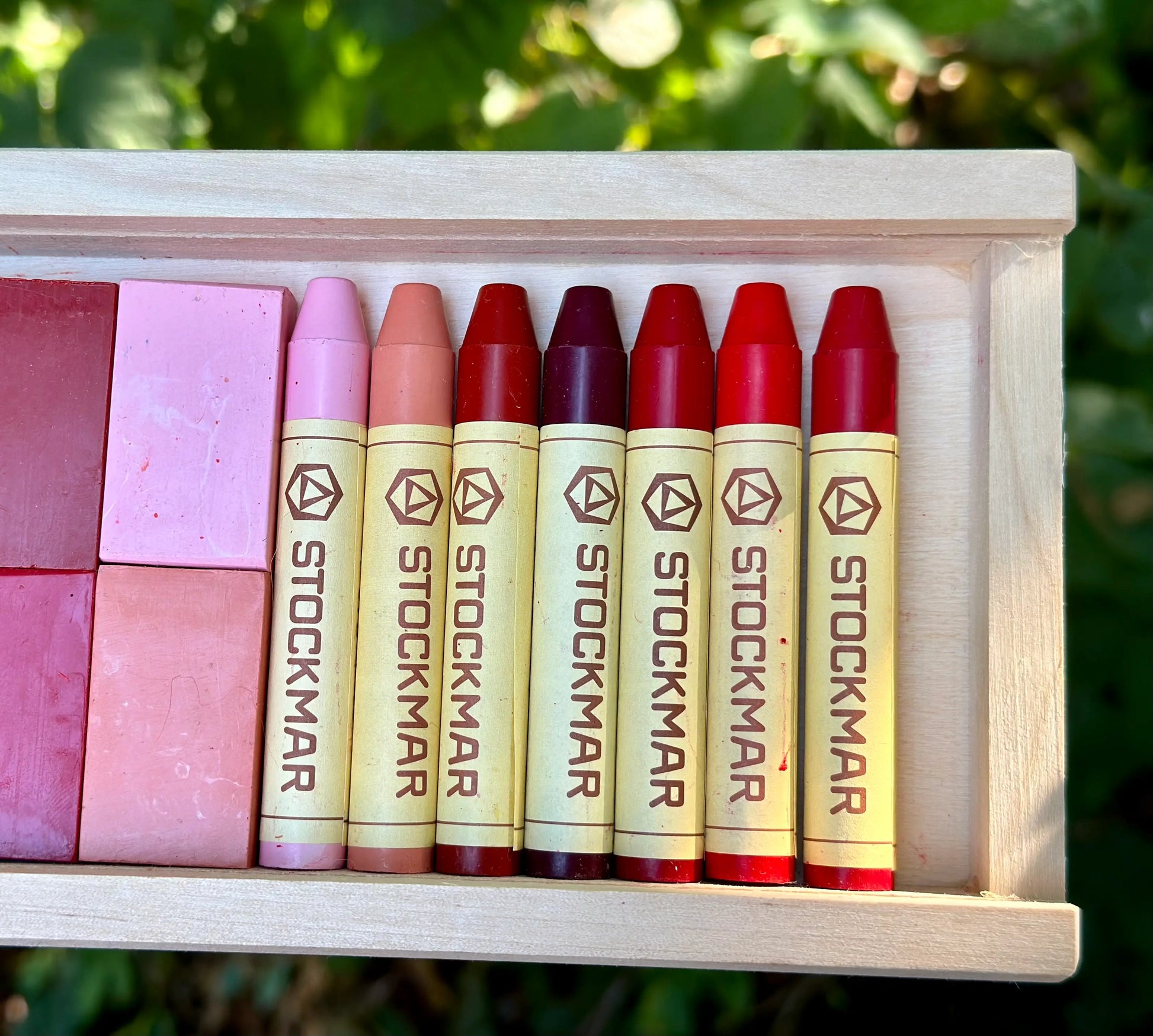Set of Stockmar crayons in a wooden box with a natural background