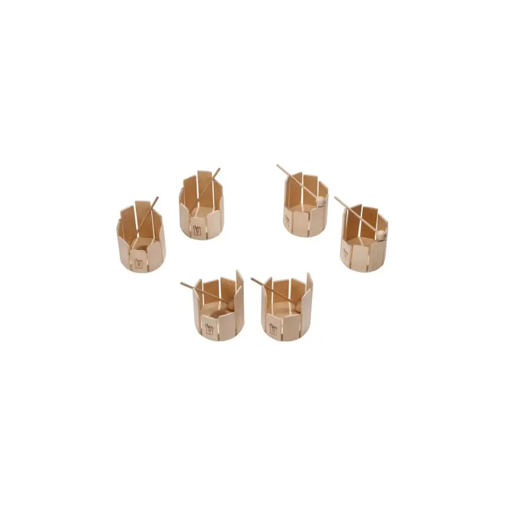 Wooden stir drum xylophone musical instrument with a mallet on a light blue background