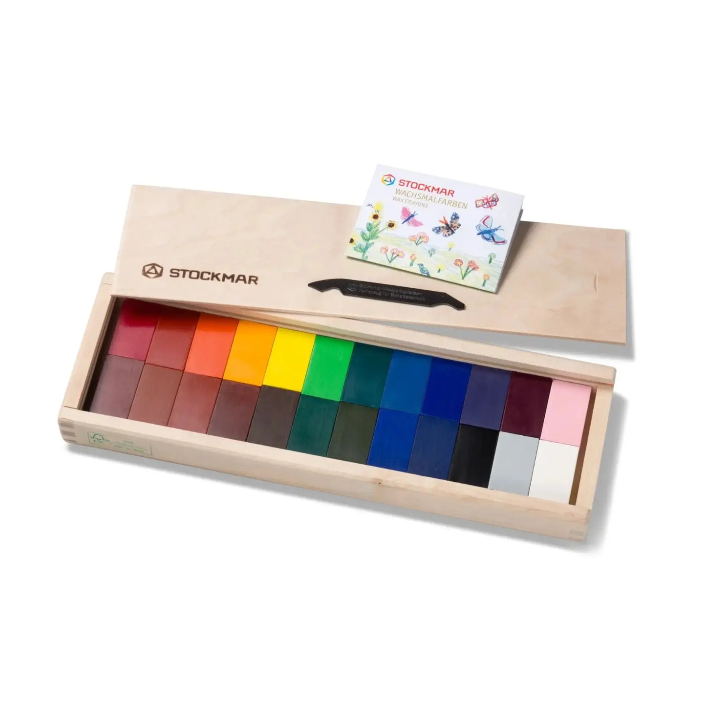 Set of Stockmar block crayons in a wooden box on a white background