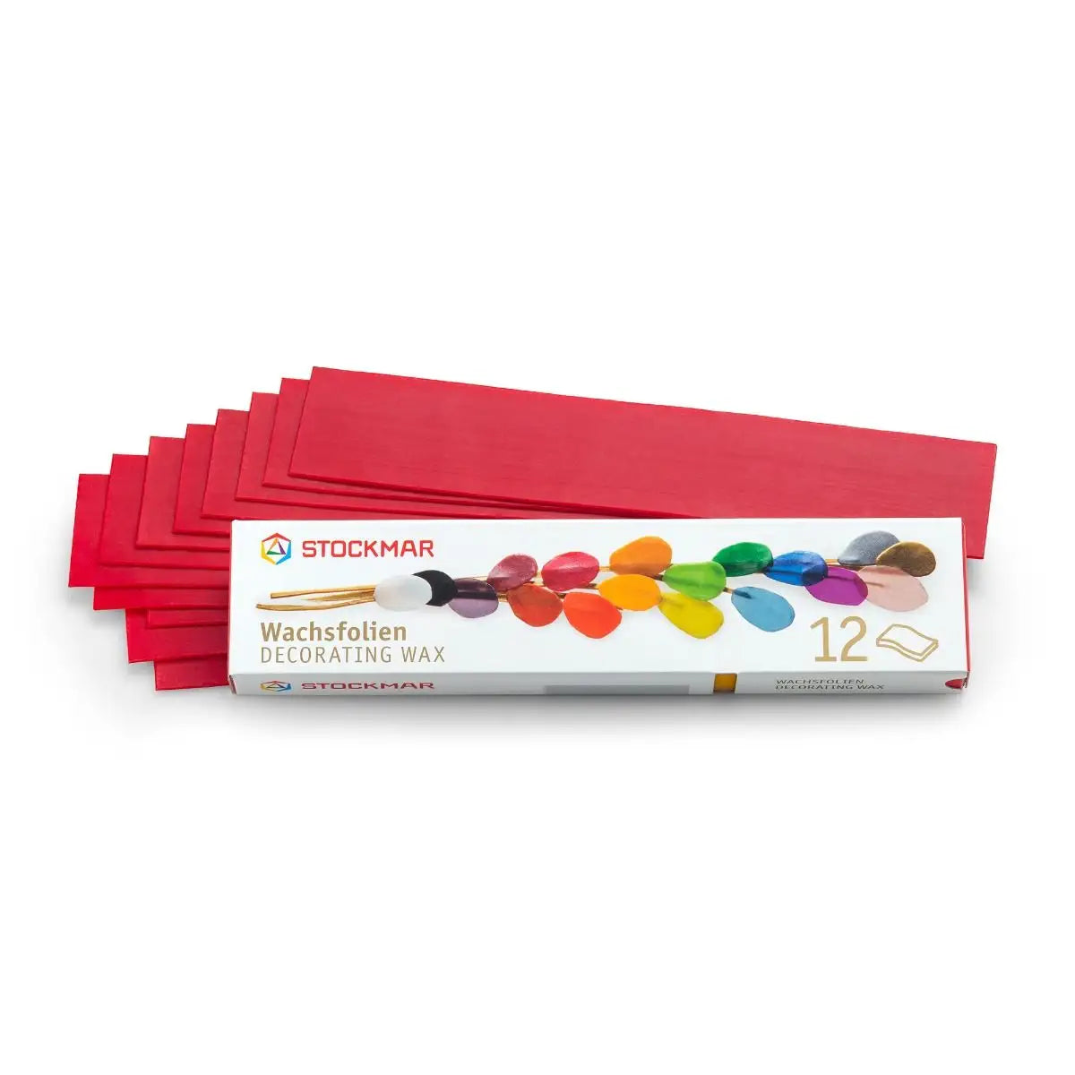Box of Stockmar decorating wax sheets with red sheets on a white background
