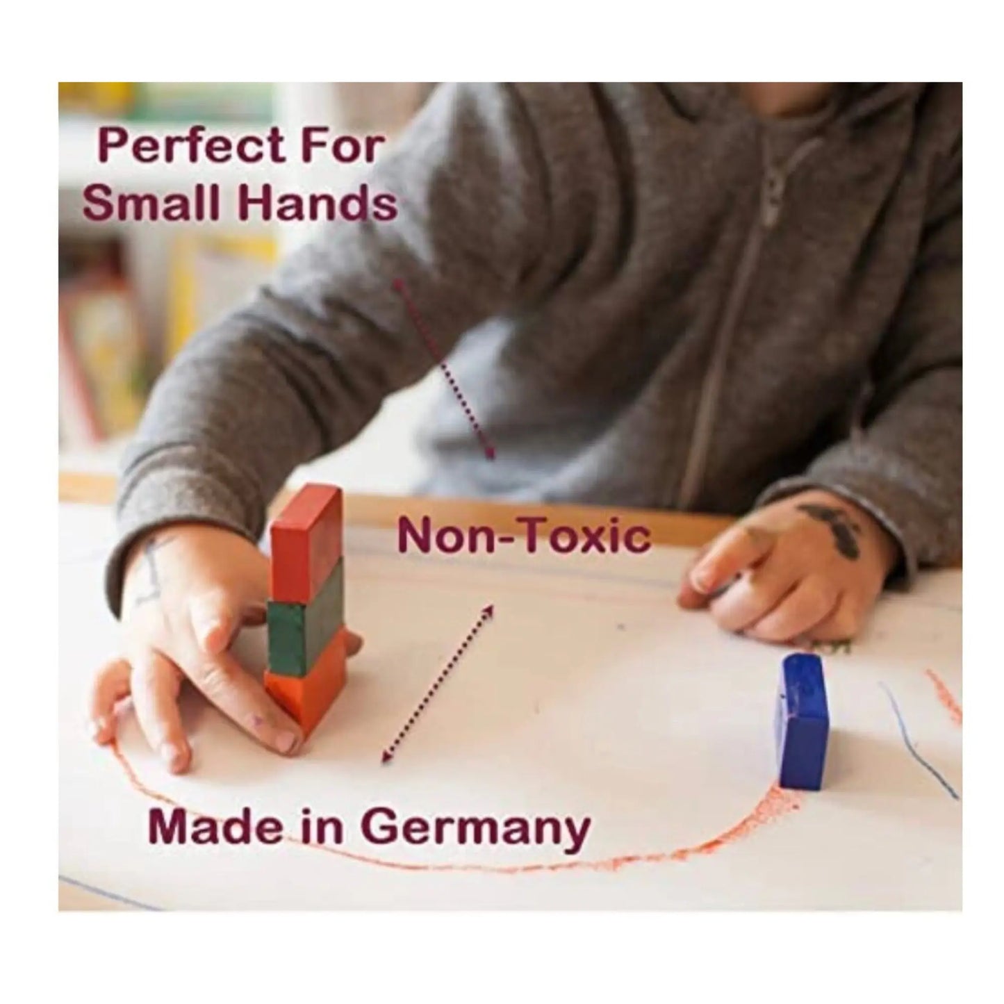 Child playing with Stockmar block crayons on a table, with text indicating 'Perfect For Small Hands', 'Non-Toxic', and 'Made in Germany'.