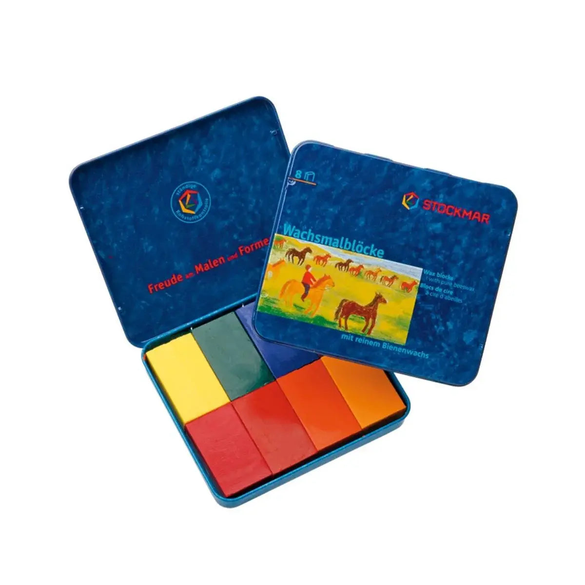 Colorful Stockmar crayons in a blue tin with a horse illustration on a white background