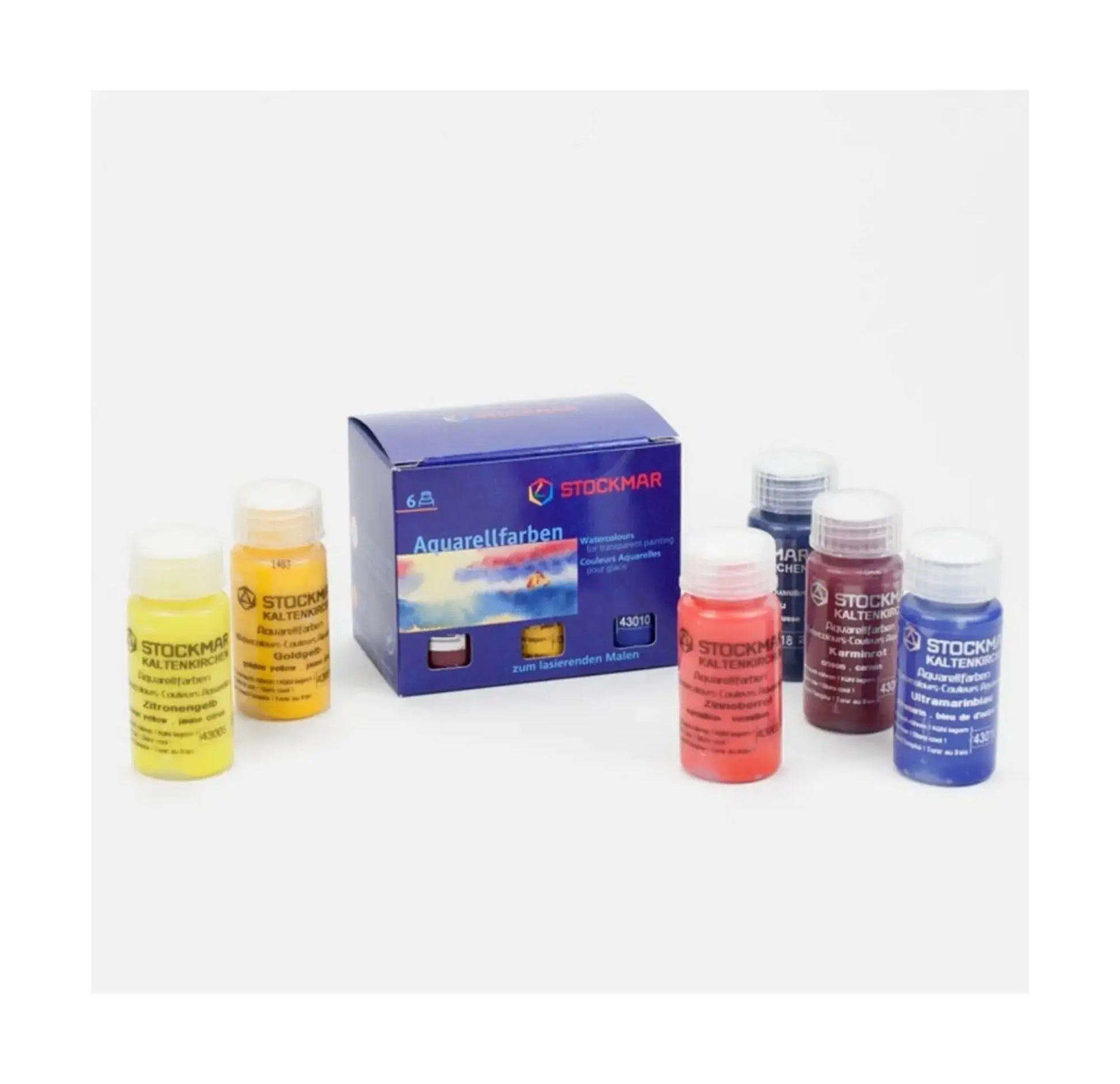 Set of Stockmar watercolor bottles and packaging on a white background