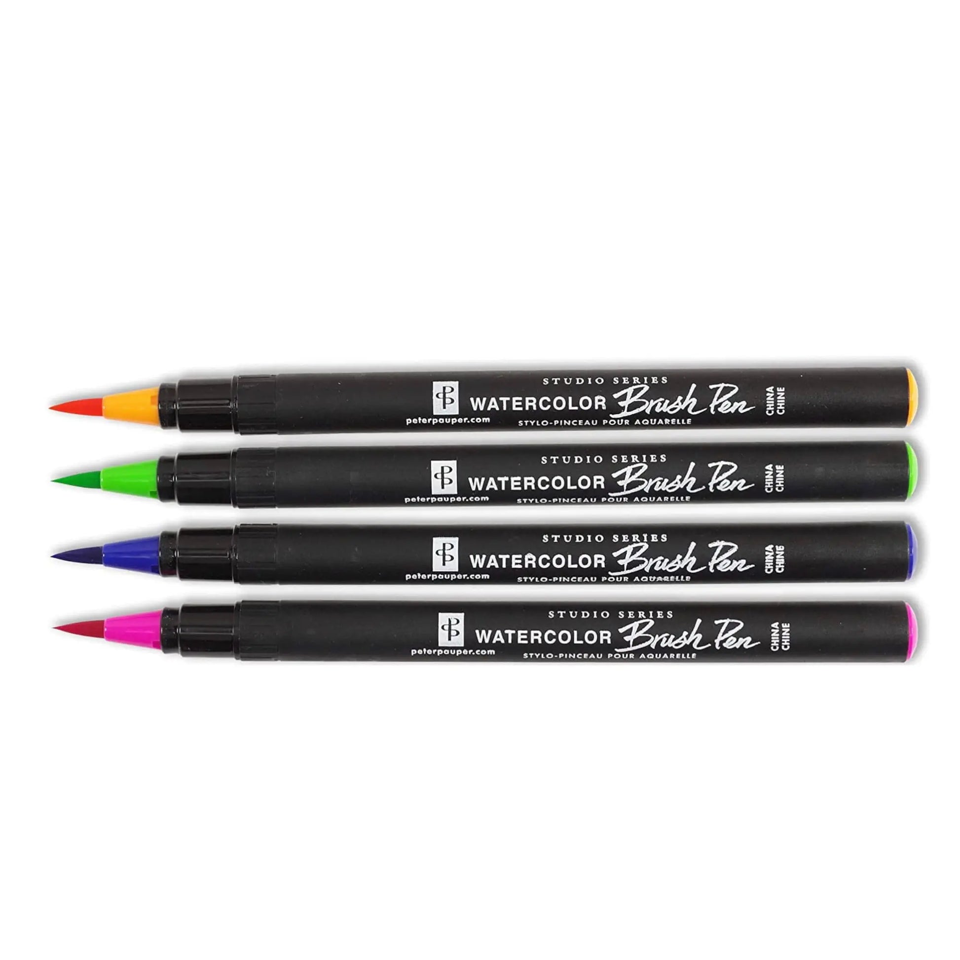 Set of watercolor brush pens with colored tips on a white background