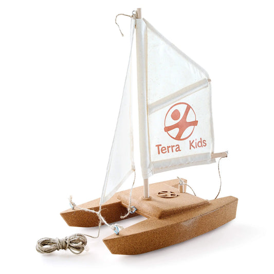 Wooden toy sailboat with a clear sail displaying 'Terra Kids' on a white background