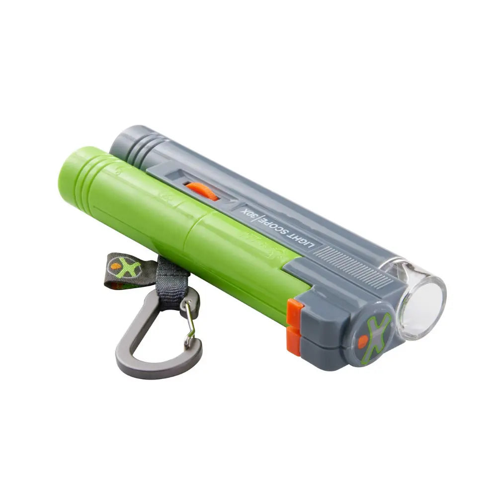 Green and gray kid's field microscope with carabiner on a white background