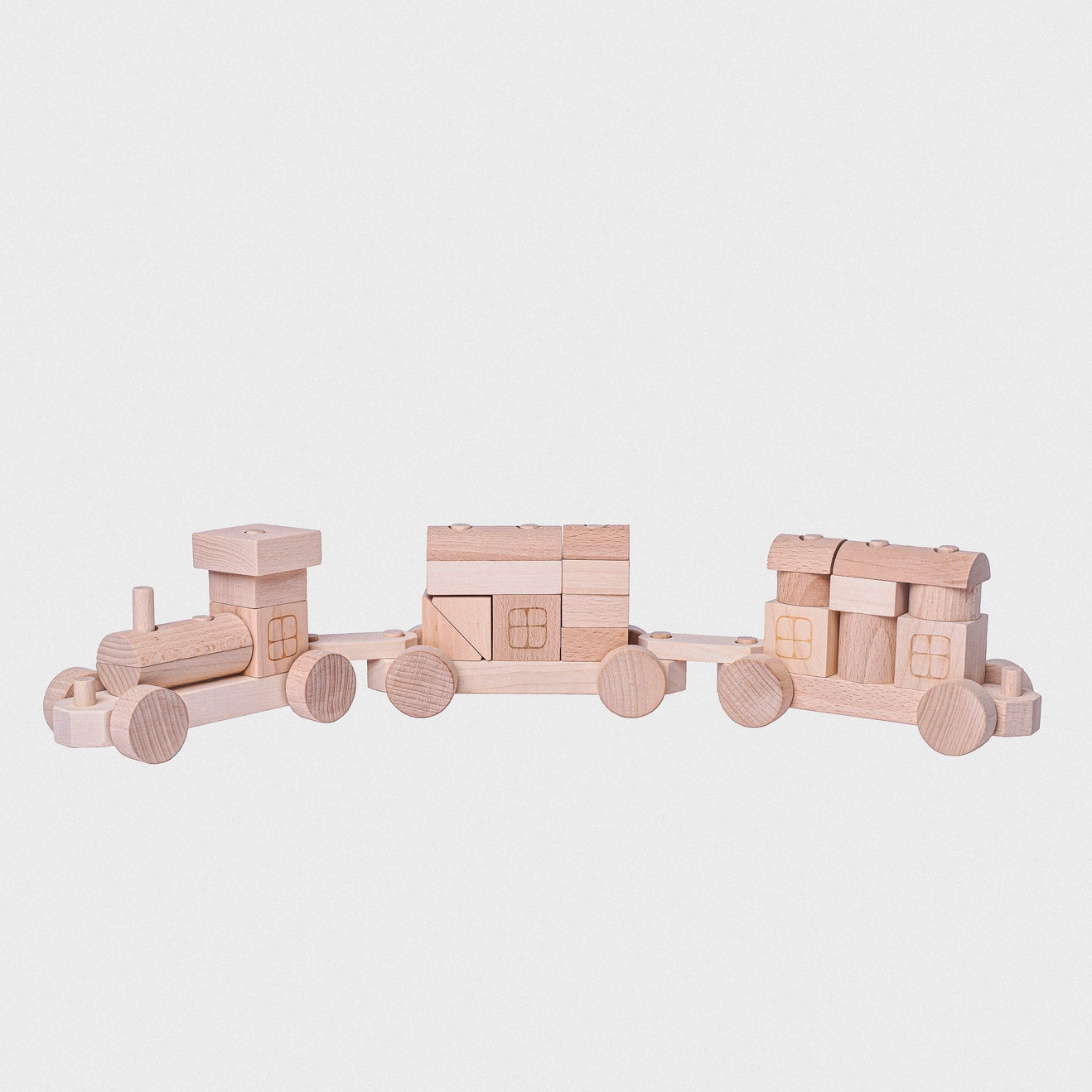 Wooden Toy Train with Stacking Blocks on light gray background