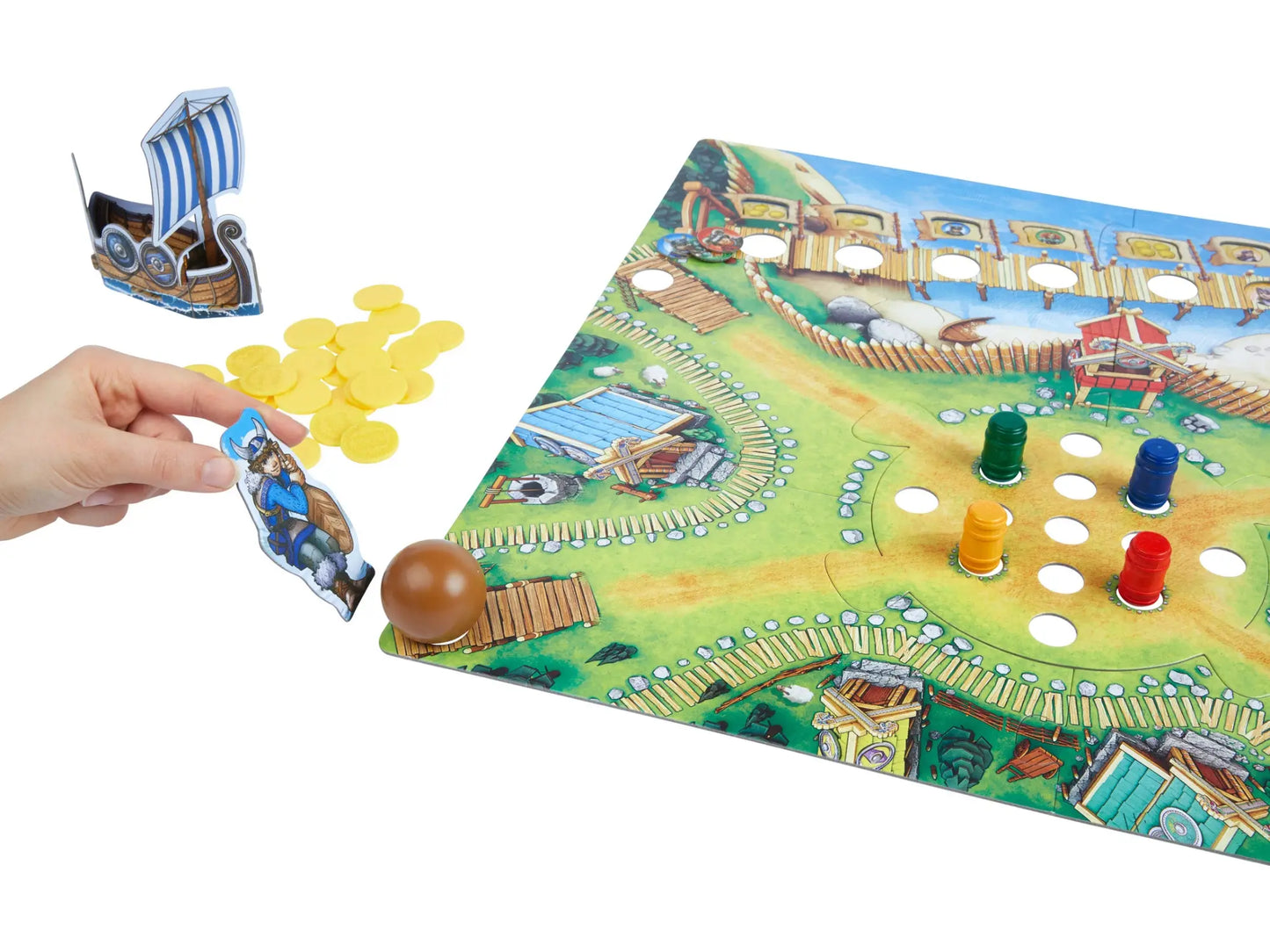 HABA Board game with colorful pieces and a hand interacting with it on a white background