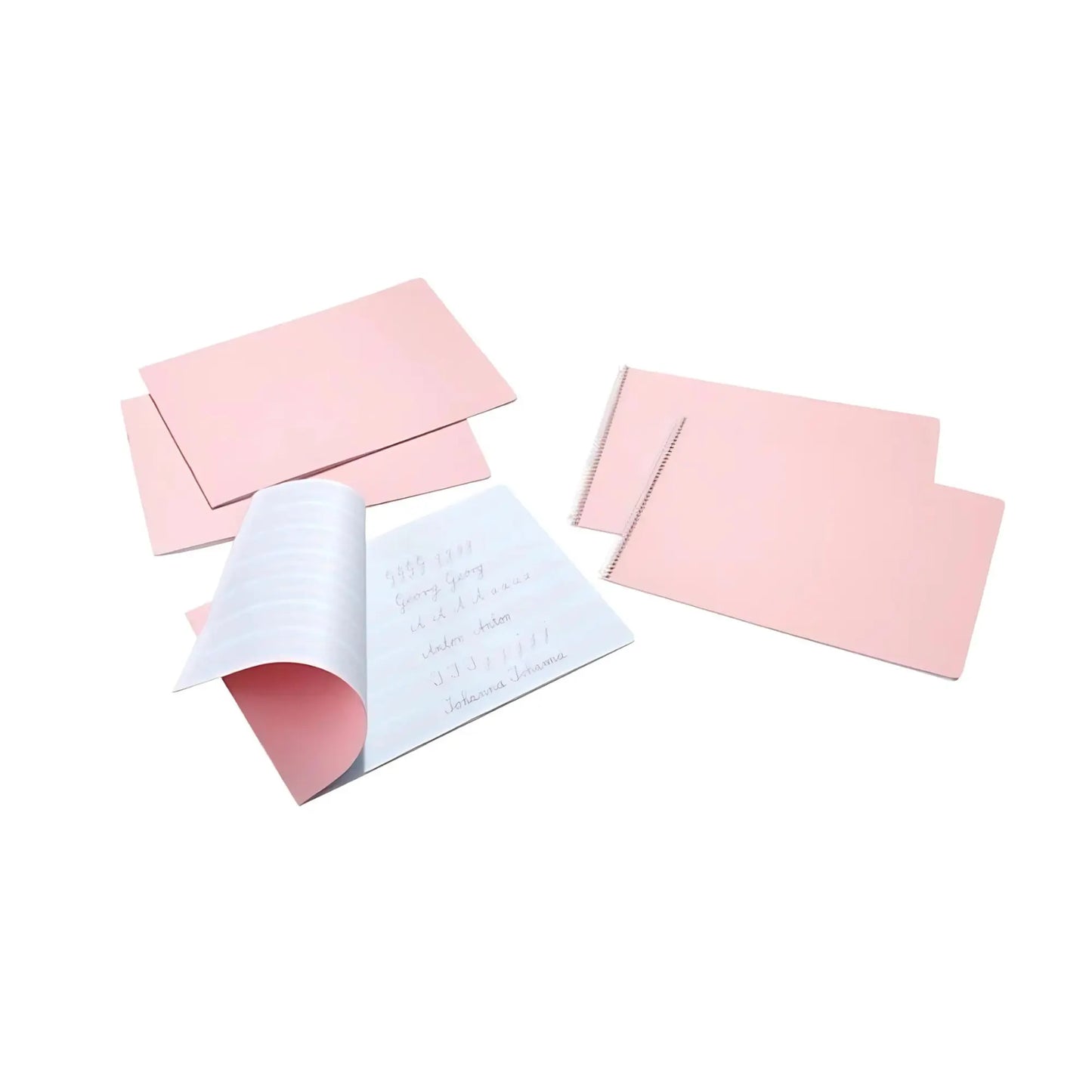 Pink covered handwriting books on a white background
