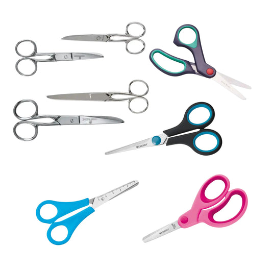 Collection of various pairs of scissors with different handles on a white background