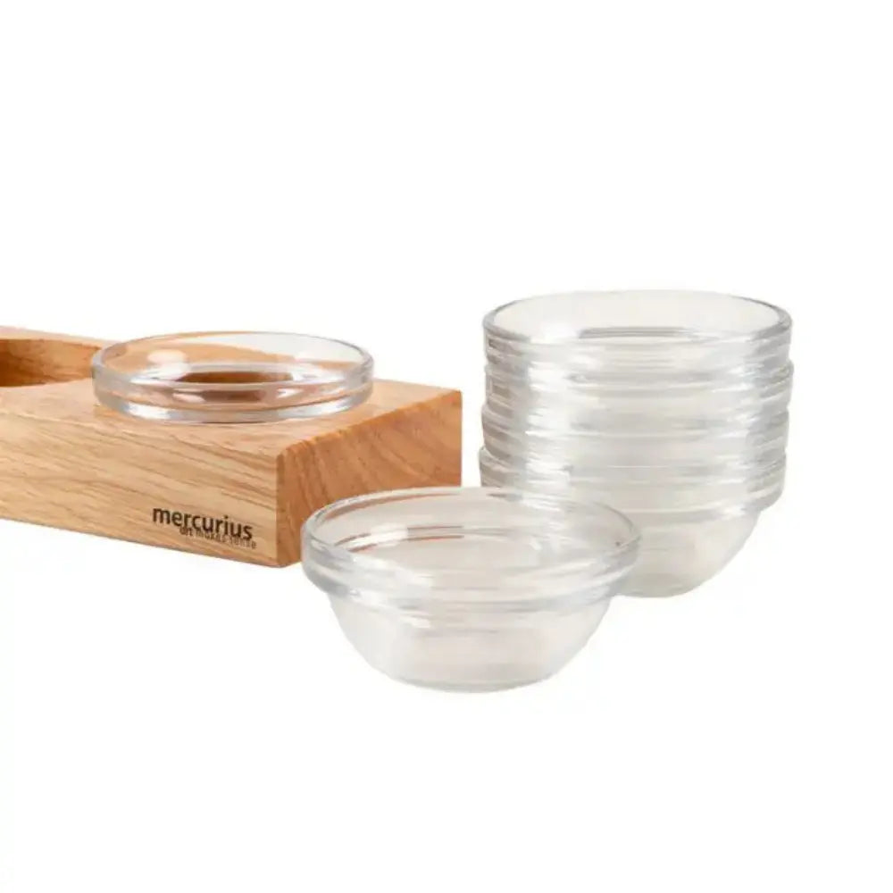 Set of clear glass bowls with a wooden tray branded 'mercurius' on a white background