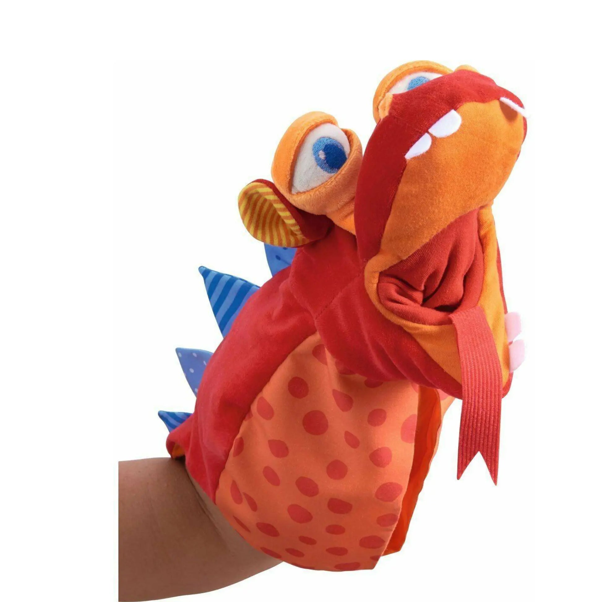 Colorful dragon glove puppet on a hand against a white background
