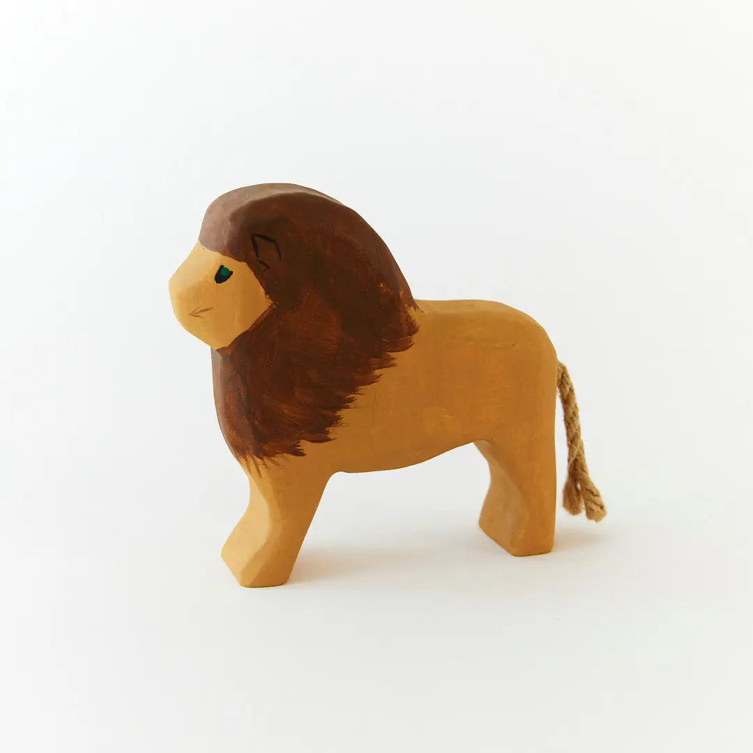 Toy lion figure on a white background