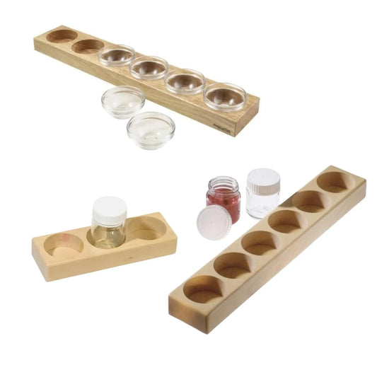 Assorted sizes of wooden paint jar holders and jars for watercolor painting