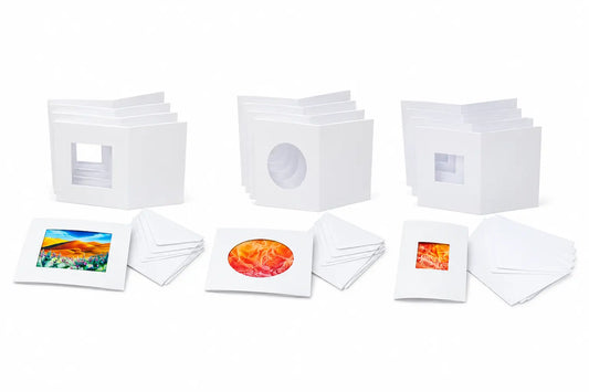 White A6 encaustic window cards with rectangle, oval, and square openings displayed with matching envelopes and sample encaustic artwork
