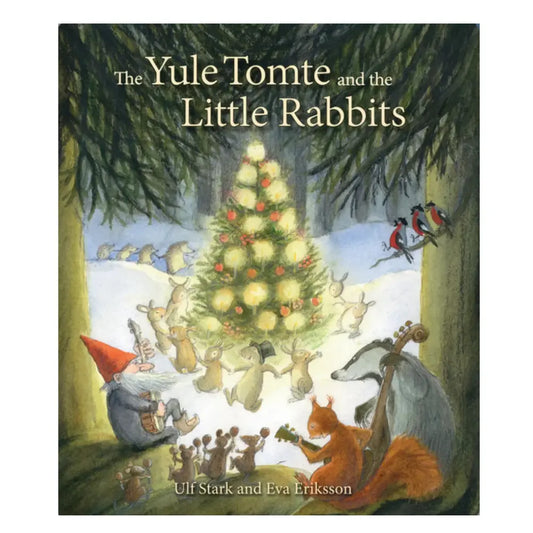 Book cover of 'The Yule Tomte and the Little Rabbits' with a festive scene featuring a tree and characters.