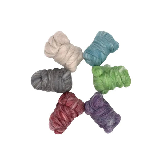 Alpaca and merino wool top fiber bundle for spinning and felting on white background