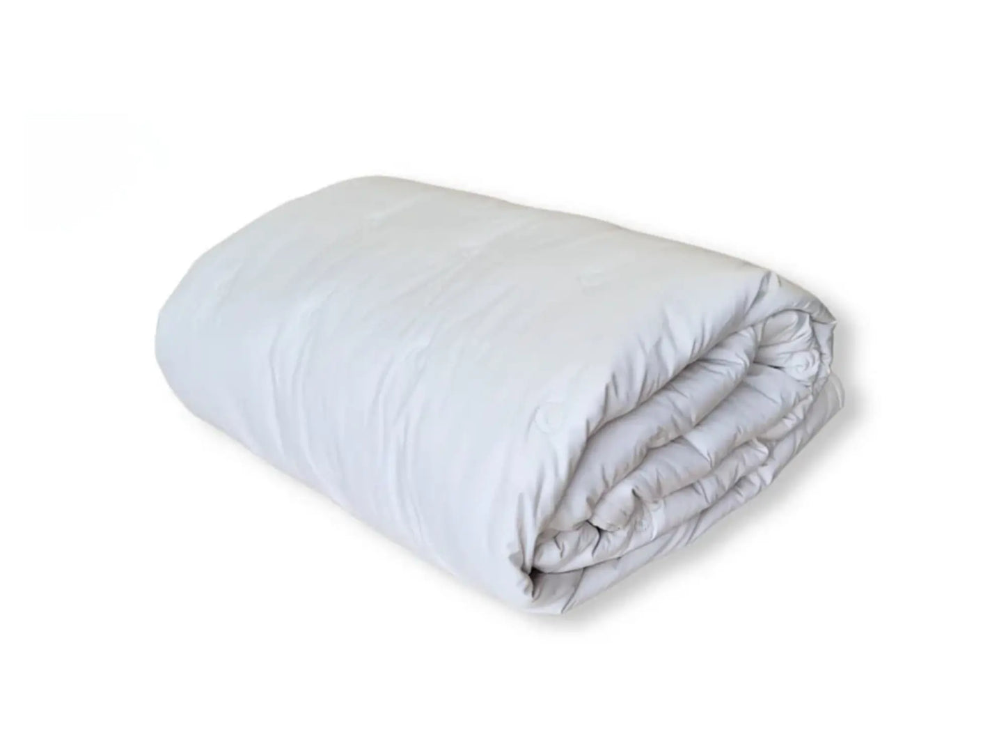 Rolled alpaca wool comforter displaying smooth organic cotton shell and even fill
