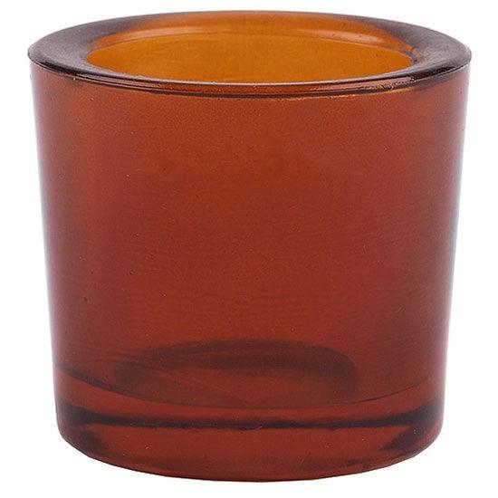 Amber glass candle holder on a white background