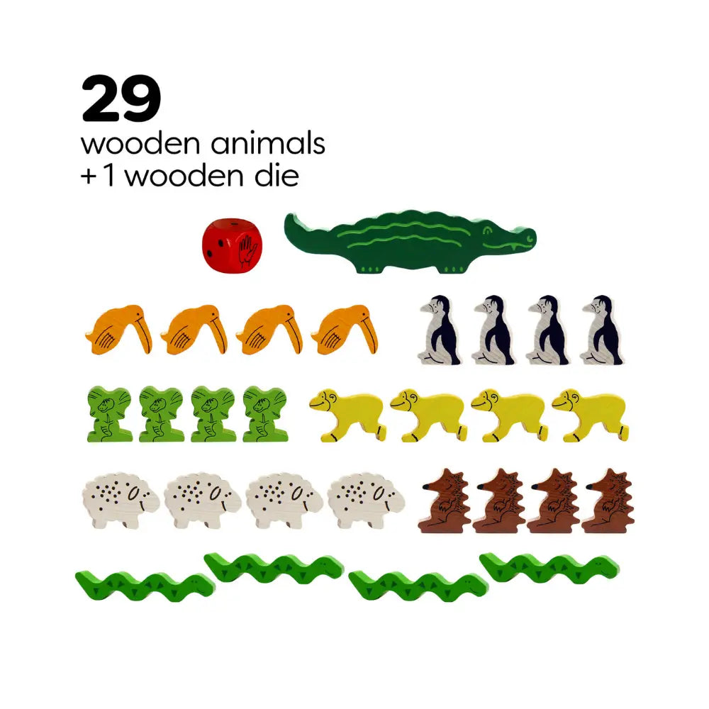 Animal Upon Animal compact game components with wooden animals and die on white background