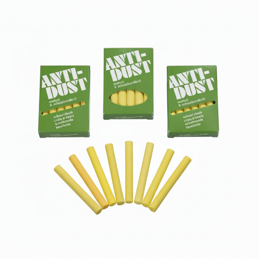 Yellow-colored chalks with 'Anti-Dust' packaging on a white background