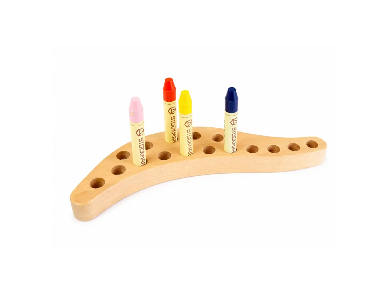 Wooden crayon holder with colorful Stockmar stick crayons on a white background