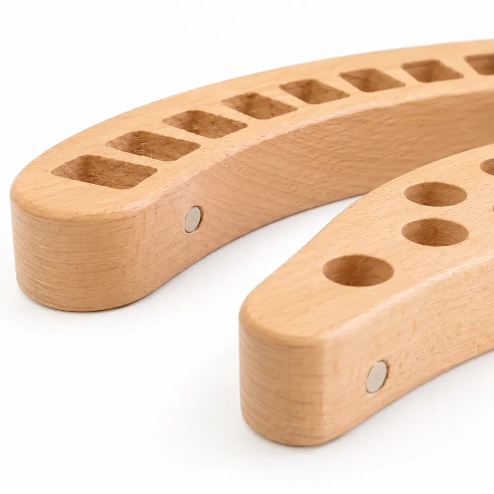 close up of magnets on wooden crayon holders