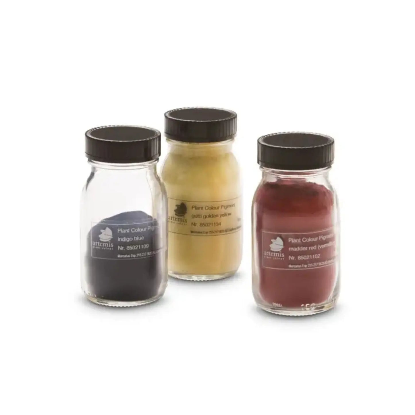 Botanical pigment powders in glass jars for handmade watercolor paint mixing