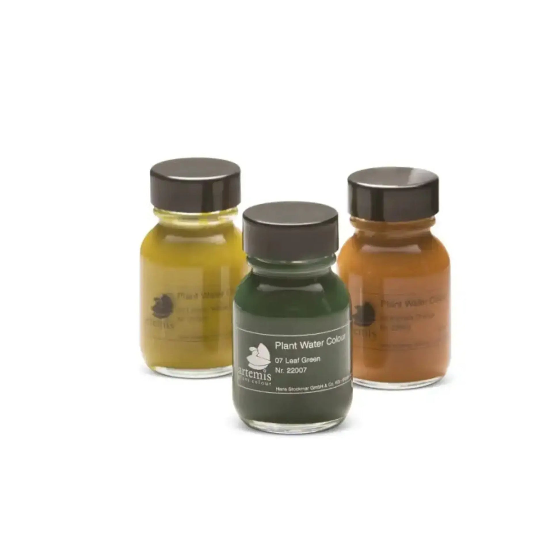 Botanical watercolor paints in glass jars made from natural plant pigments