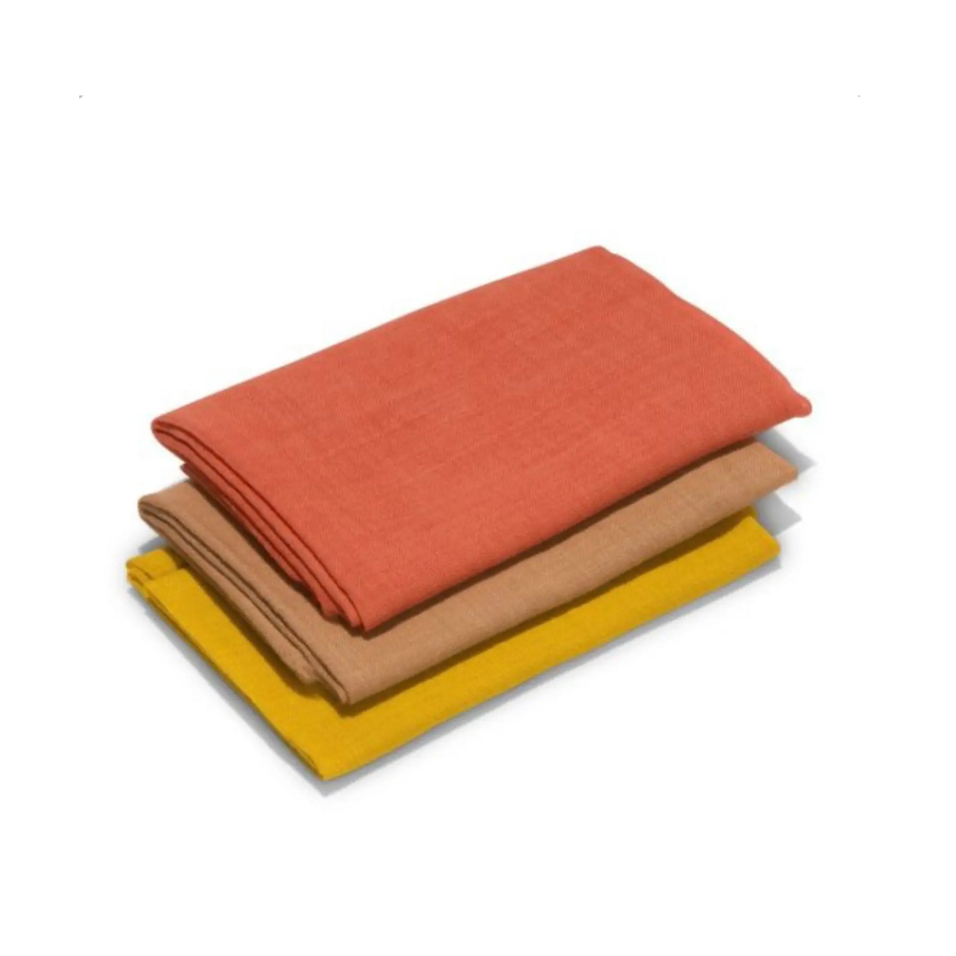 Three autumn plant dyed wool cloths folded in a stack in brown, yellow, and orange on a white background