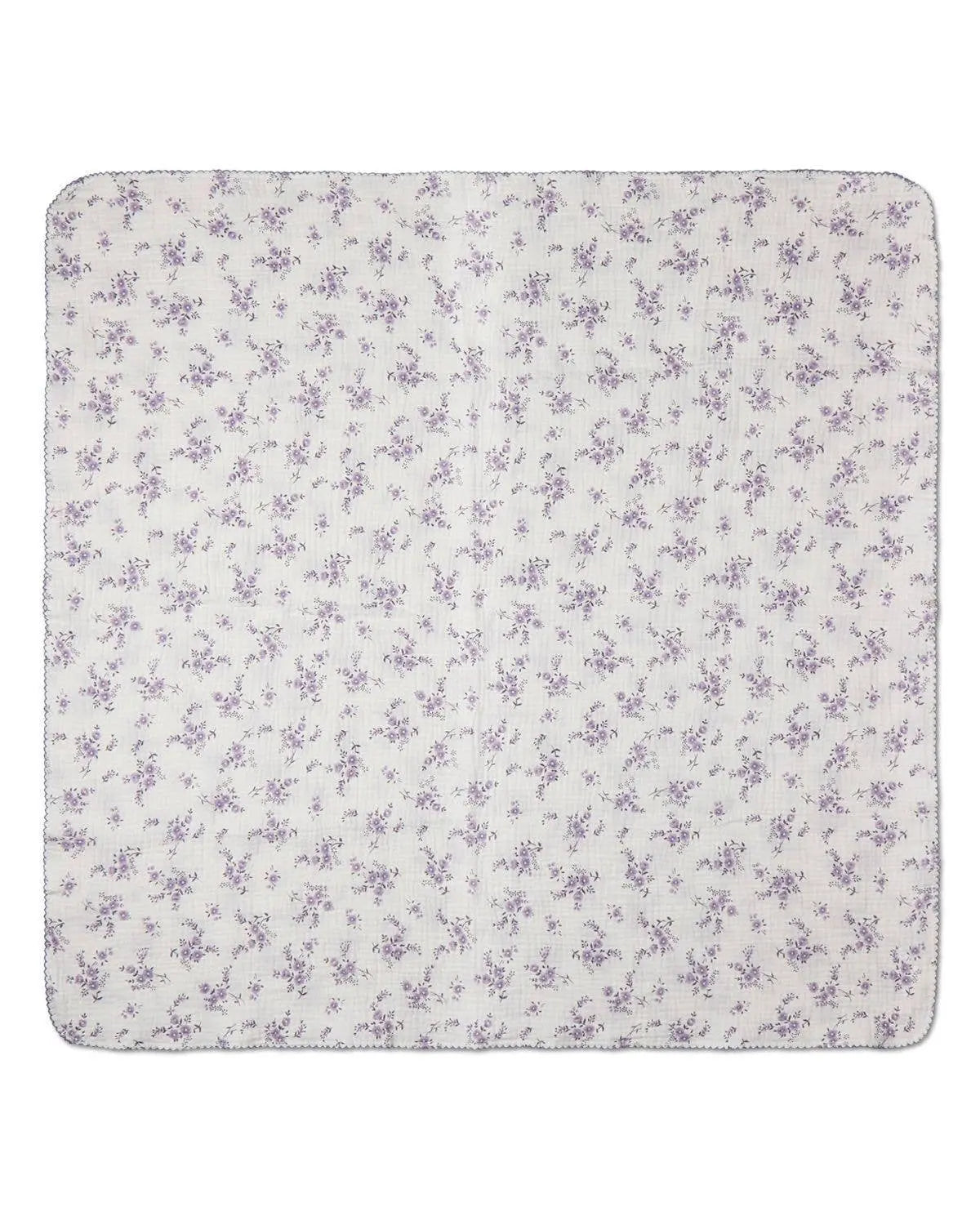 Floral cotton swaddle blanket laid flat for baby use