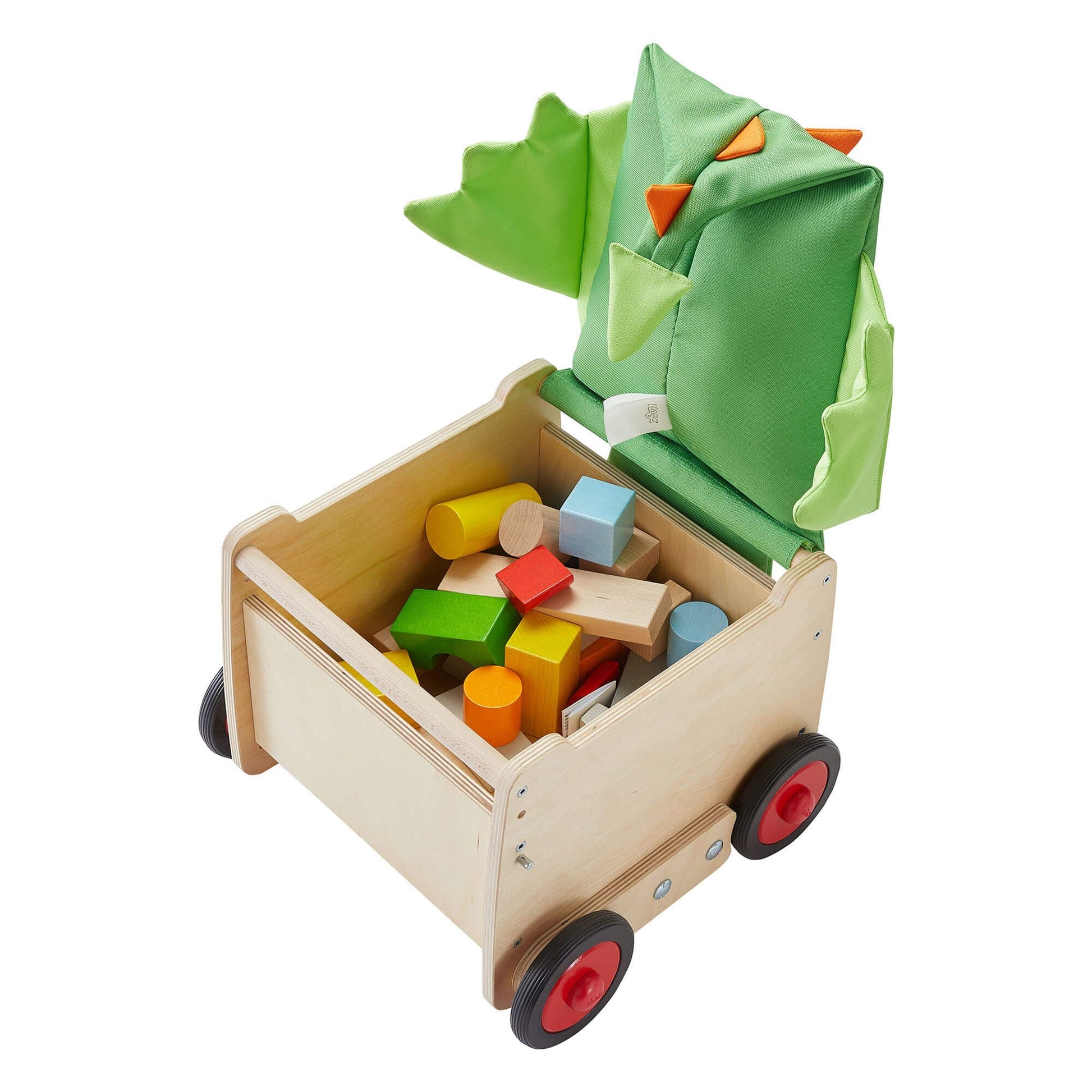 Wooden toy cart with colorful blocks and a green dinosaur-shaped cover on a white background