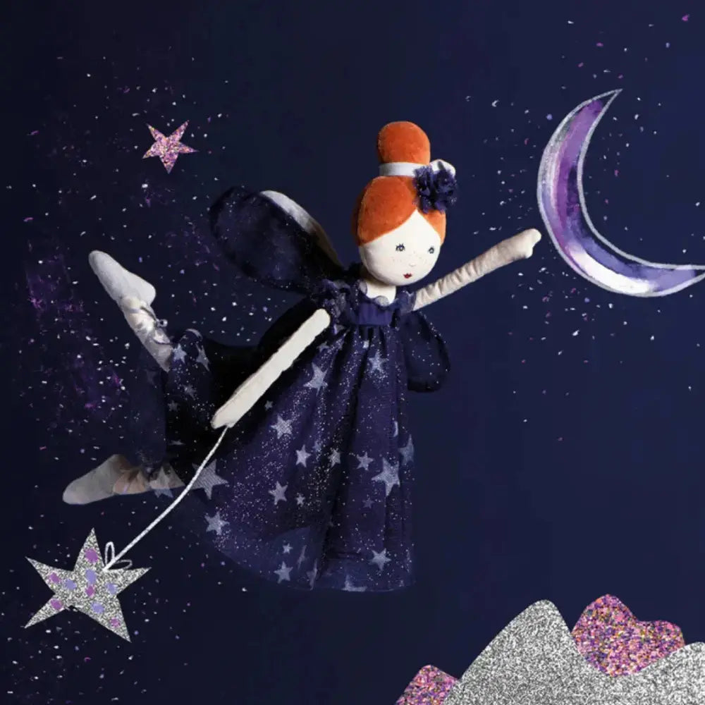 Fairy doll with a star wand against a night sky with stars and moon