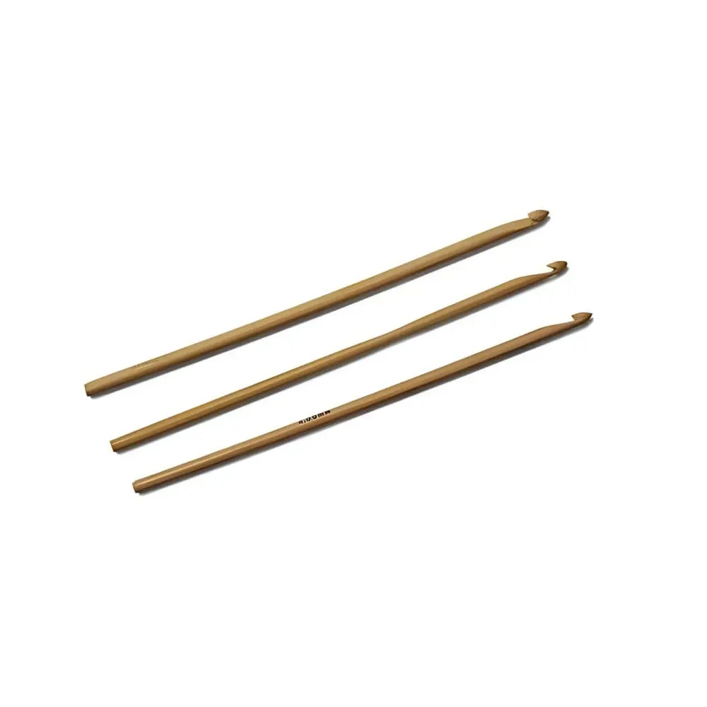 Close-up of smooth bamboo crochet hooks with shaped hook tips for yarn crafting