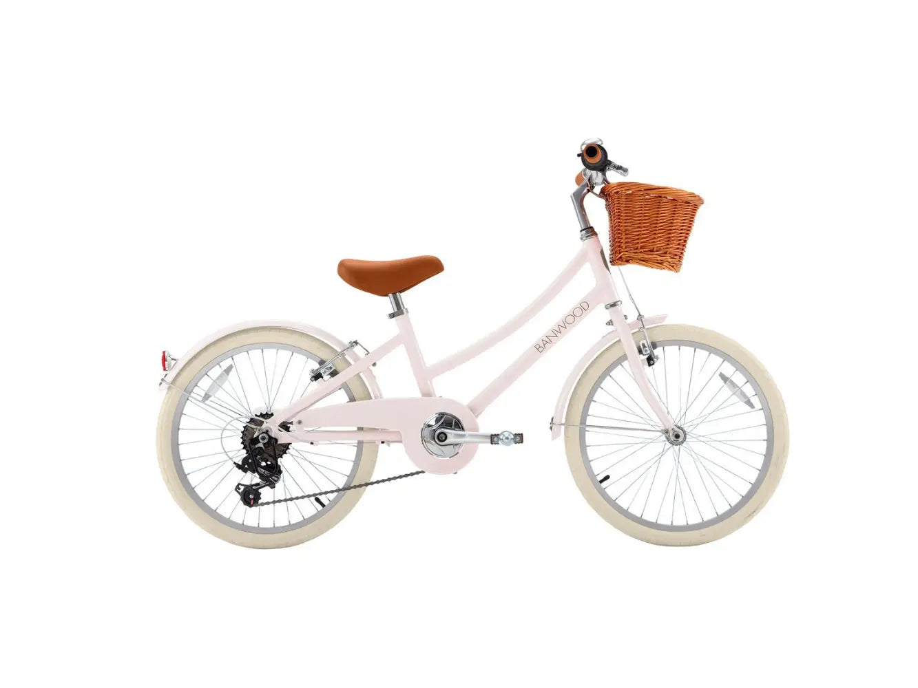 Pink children's 20 inch bicycle with a brown basket on a white background