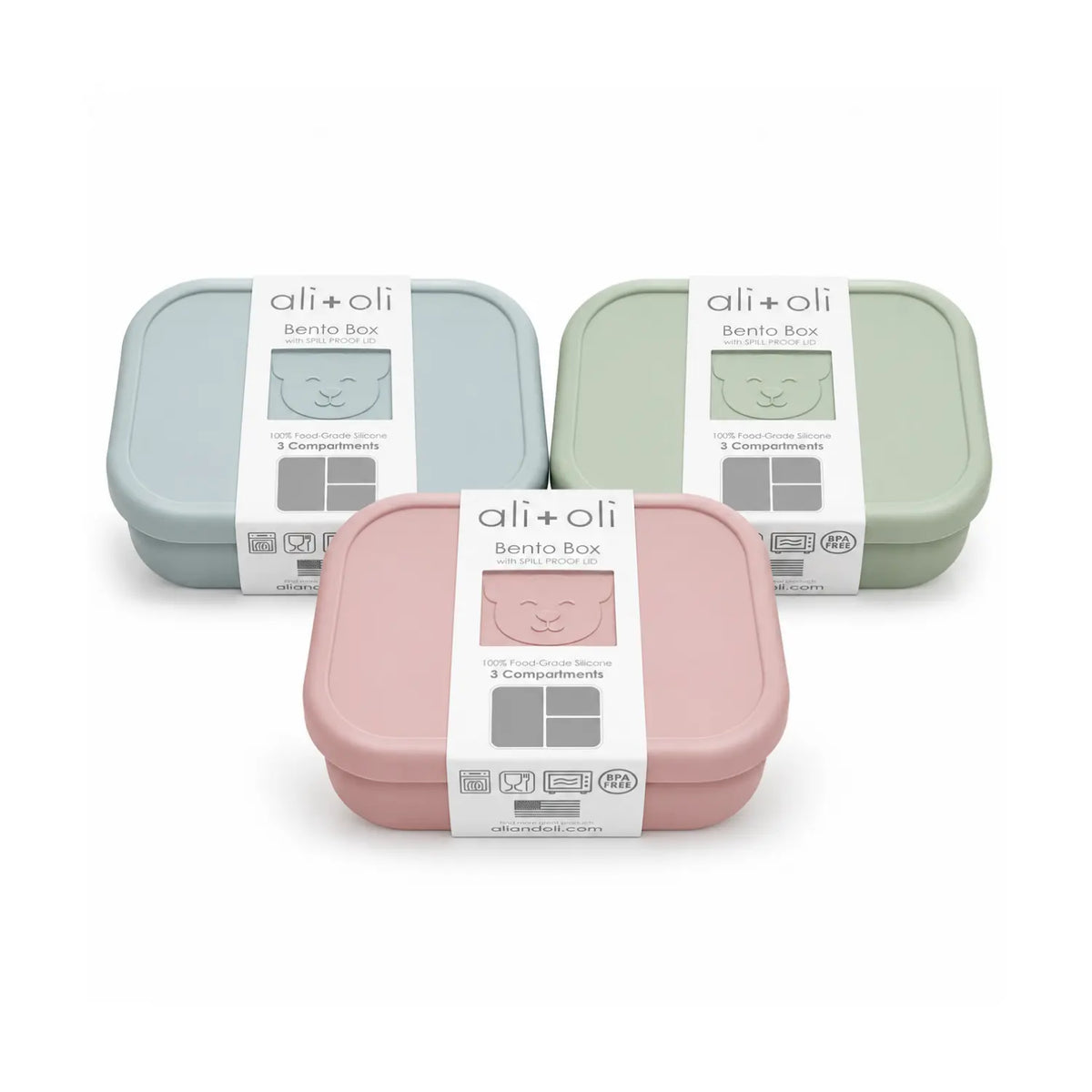 Ali+Oli Bear silicone bento box in light blue, pine green, and rose pink with retail packaging.