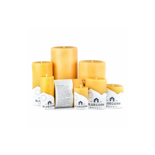 Set of candles with packaging on a white background