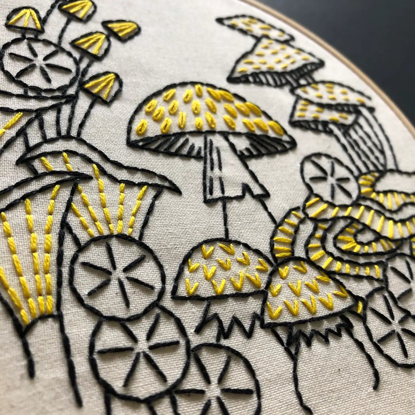 Close up detail of stitches on the beginner Mushroom Embroidery Kit