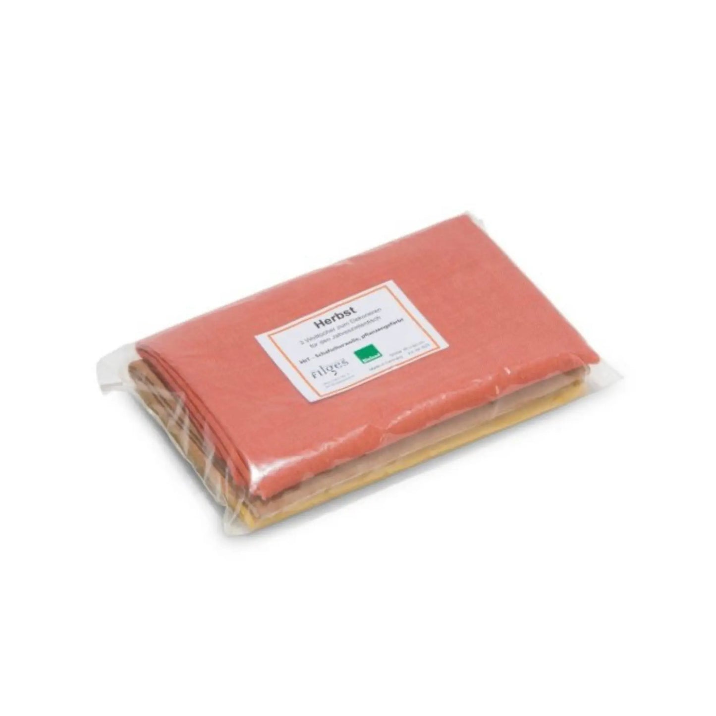 Three autumn plant dyed wool cloths folded into retail packaging in brown, yellow, and orange on a white background