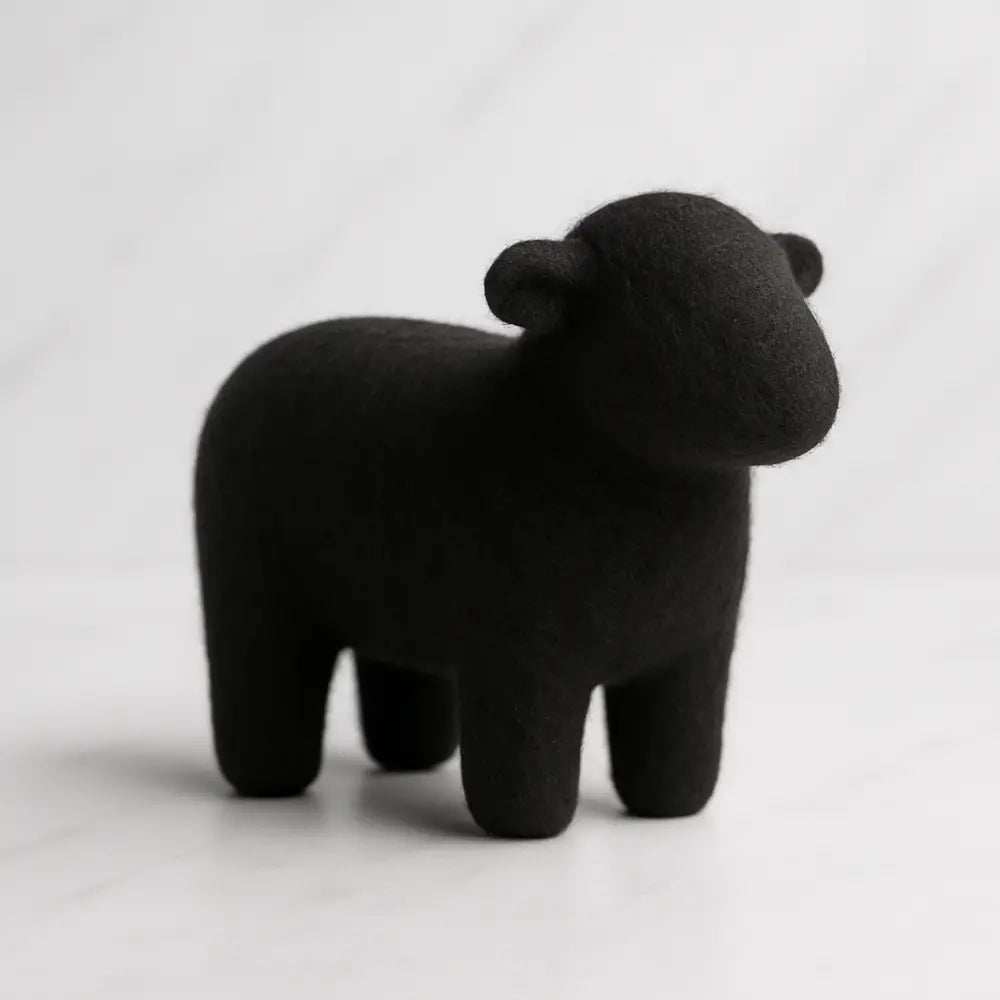Needle felted sheep using black superfine Merino wool sliver fiber