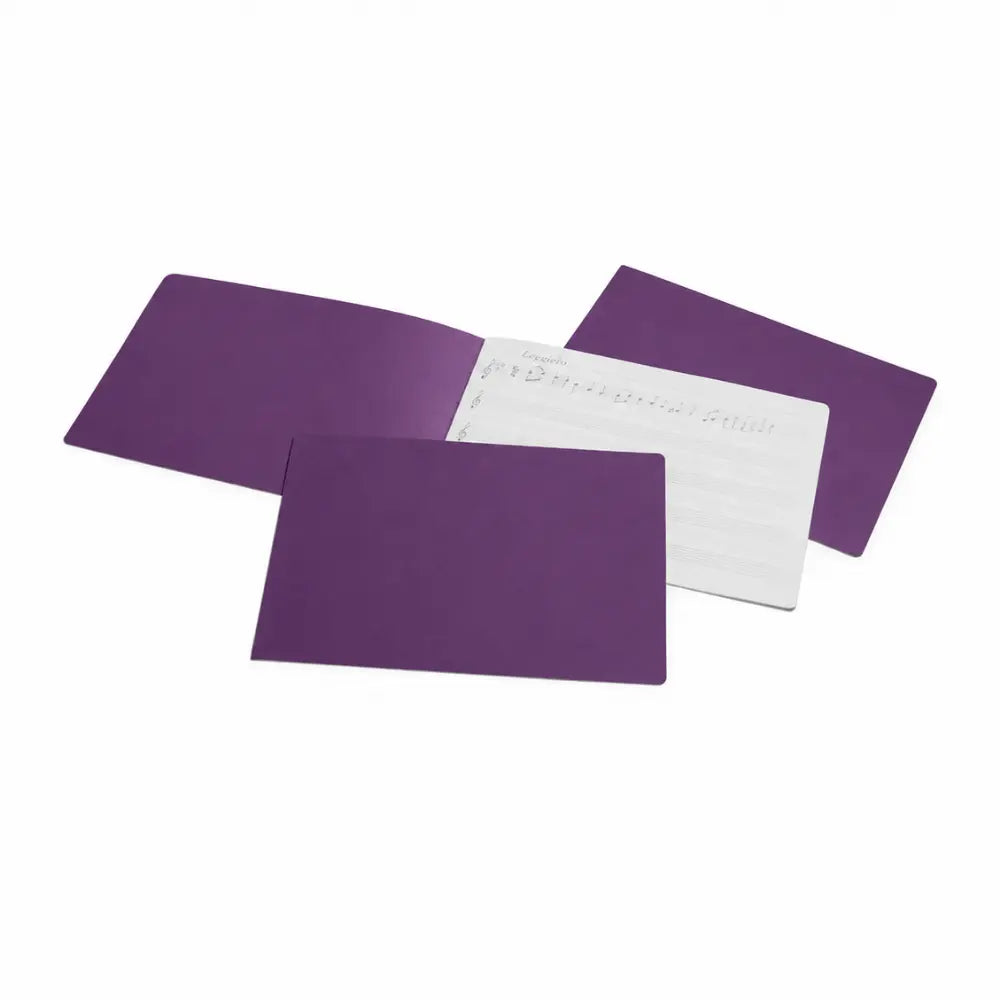 purple covered blank  music notation notebook