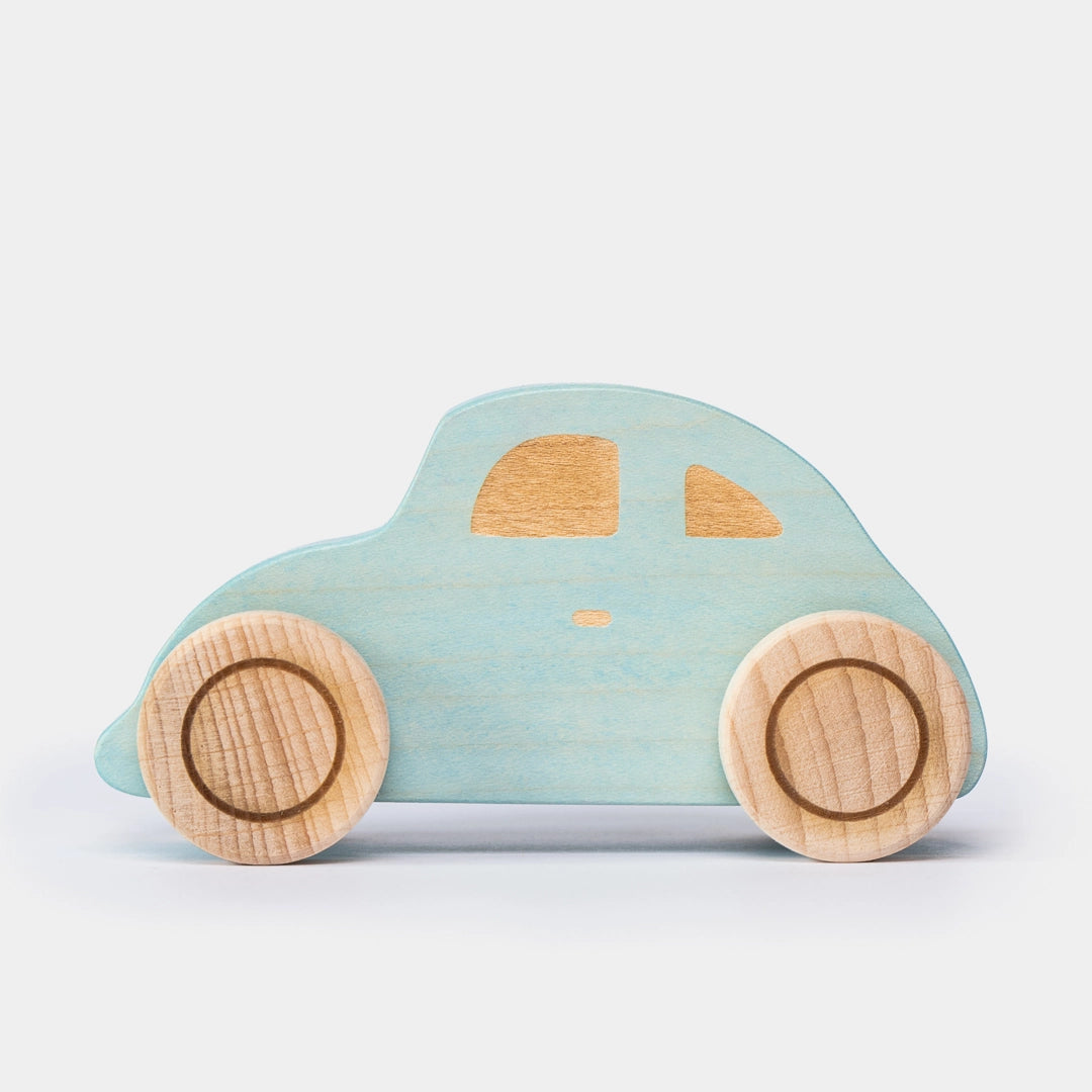 Blue wooden beetle toy car side view for preschool play 