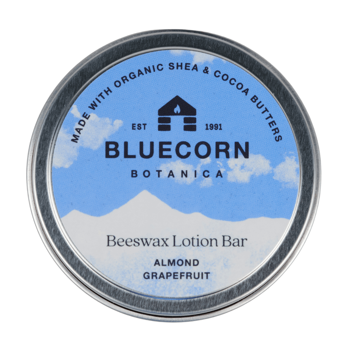Bluecorn Botanica Almond Grapefruit Beeswax Lotion Bar in round metal tin
