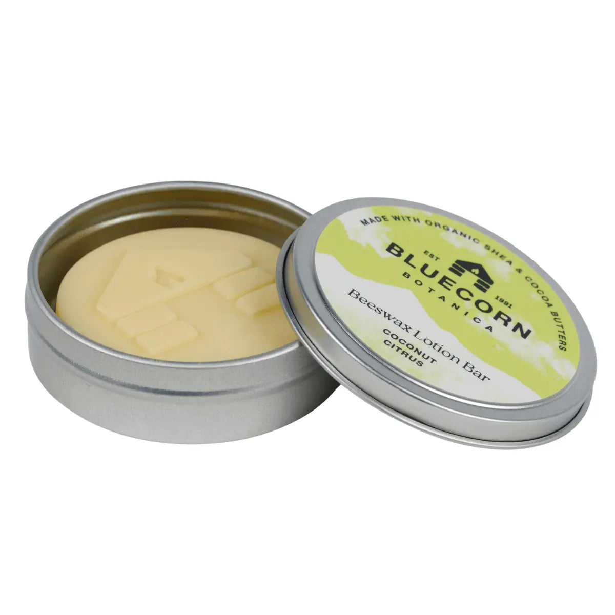Open tin of Bluecorn Botanica Coconut Citrus Beeswax Lotion Bar